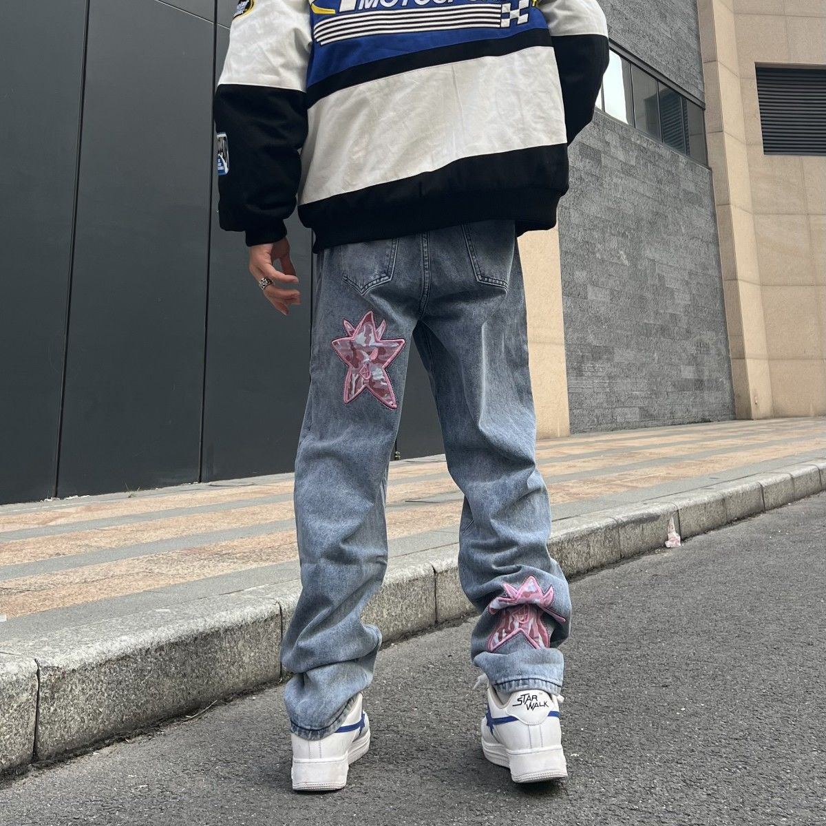 Jeans with an inscription on the front