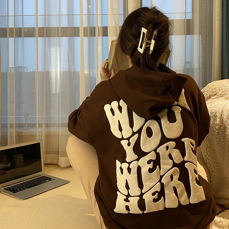 Brown sweatshirt with an inscription