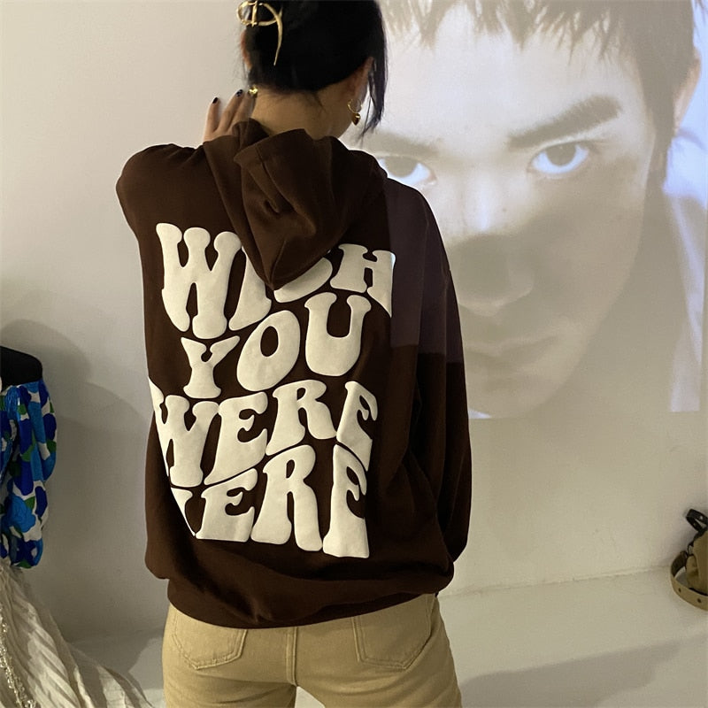 Brown sweatshirt with an inscription