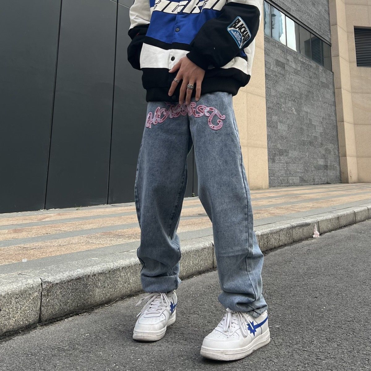 Jeans with an inscription on the front