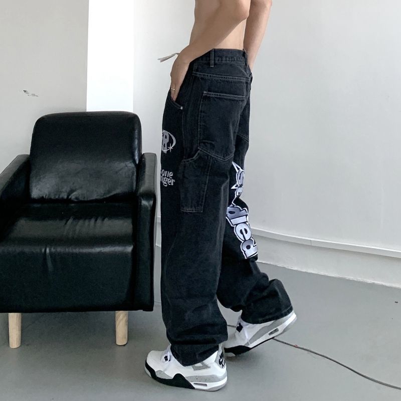 UNISEX trousers with an inscription on the leg
