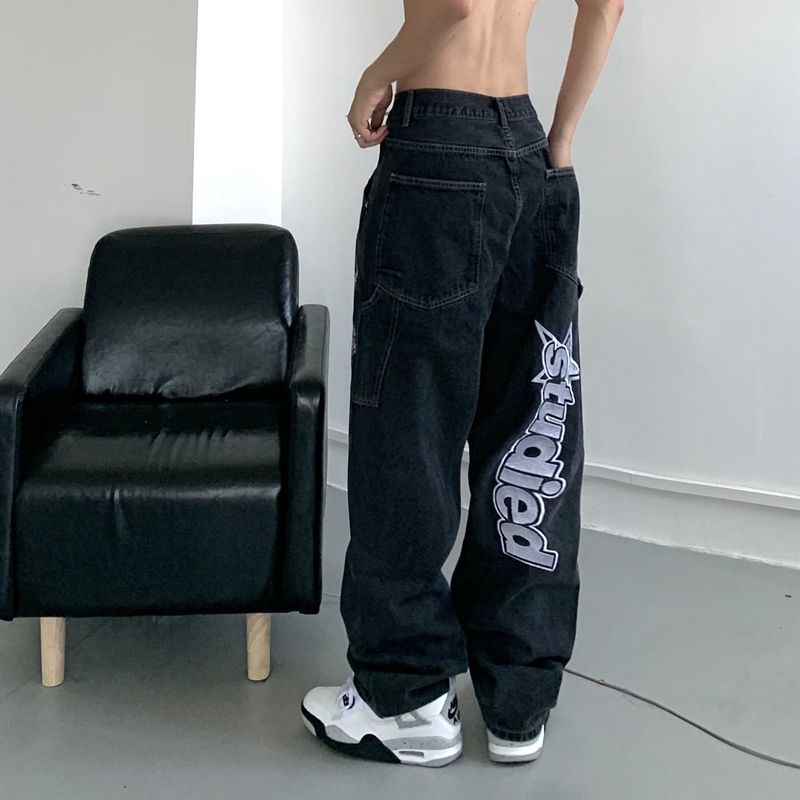 UNISEX trousers with an inscription on the leg