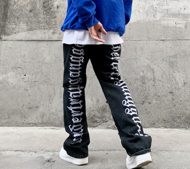 Trousers with inscriptions on the legs