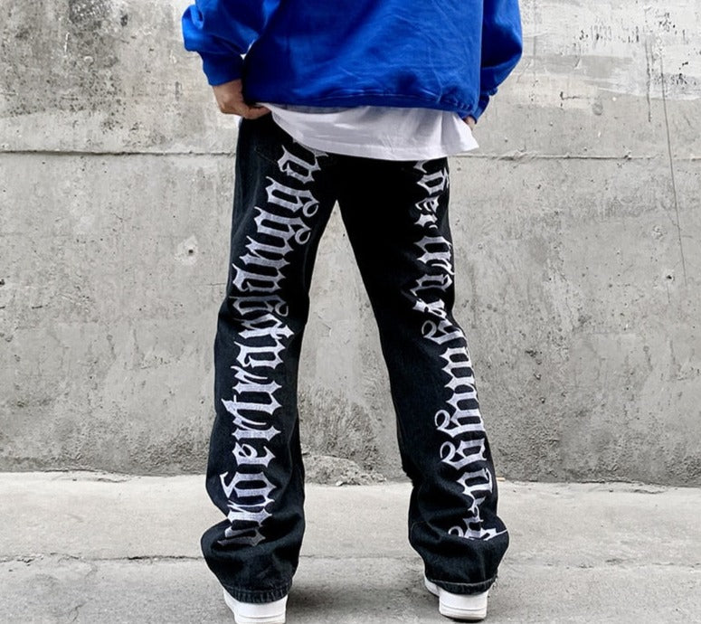 Trousers with inscriptions on the legs