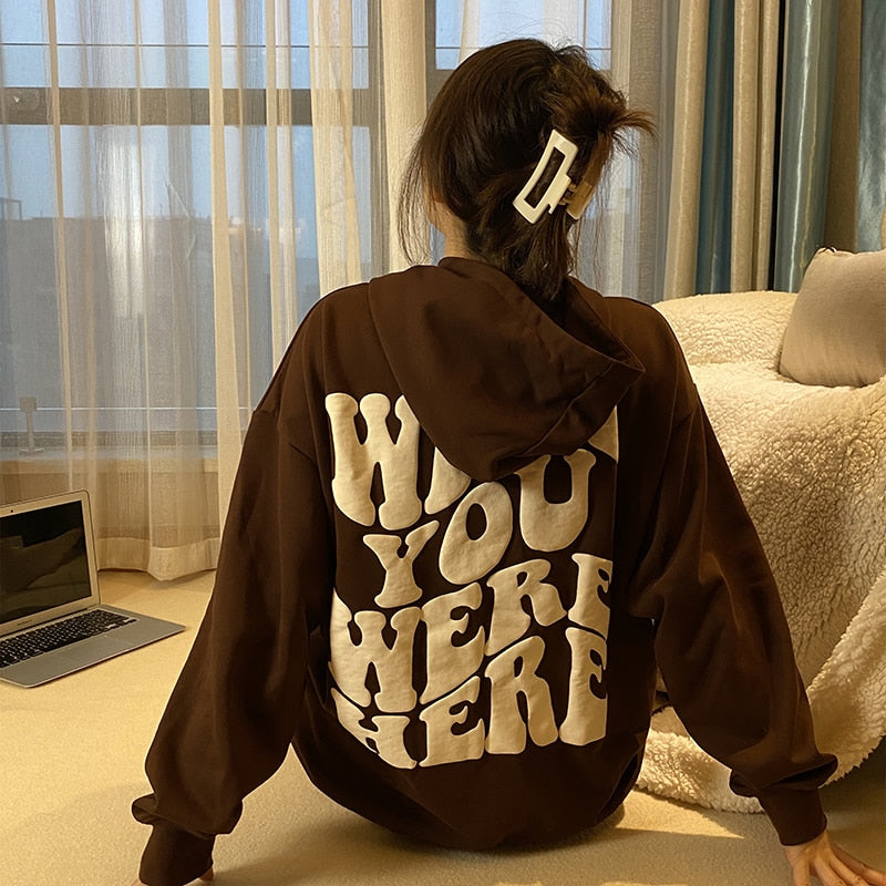 Brown sweatshirt with an inscription